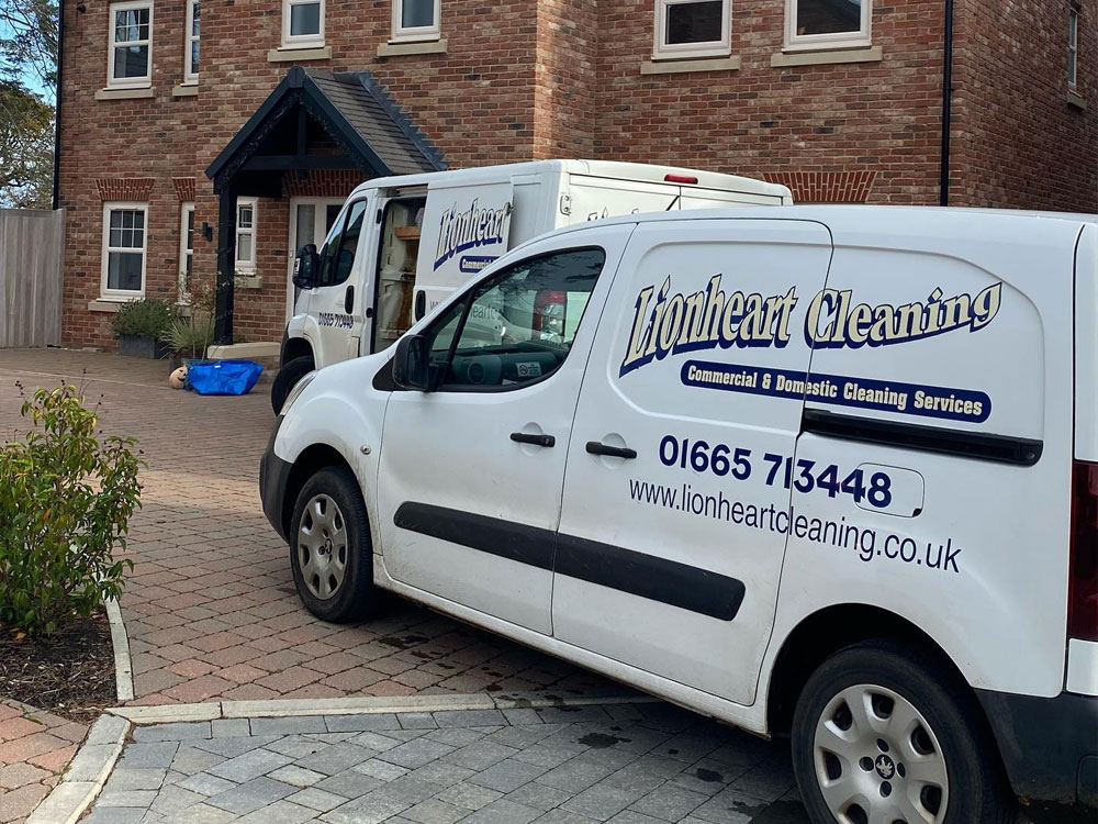 Lionheart Cleaning company vans at domestic cleaning job